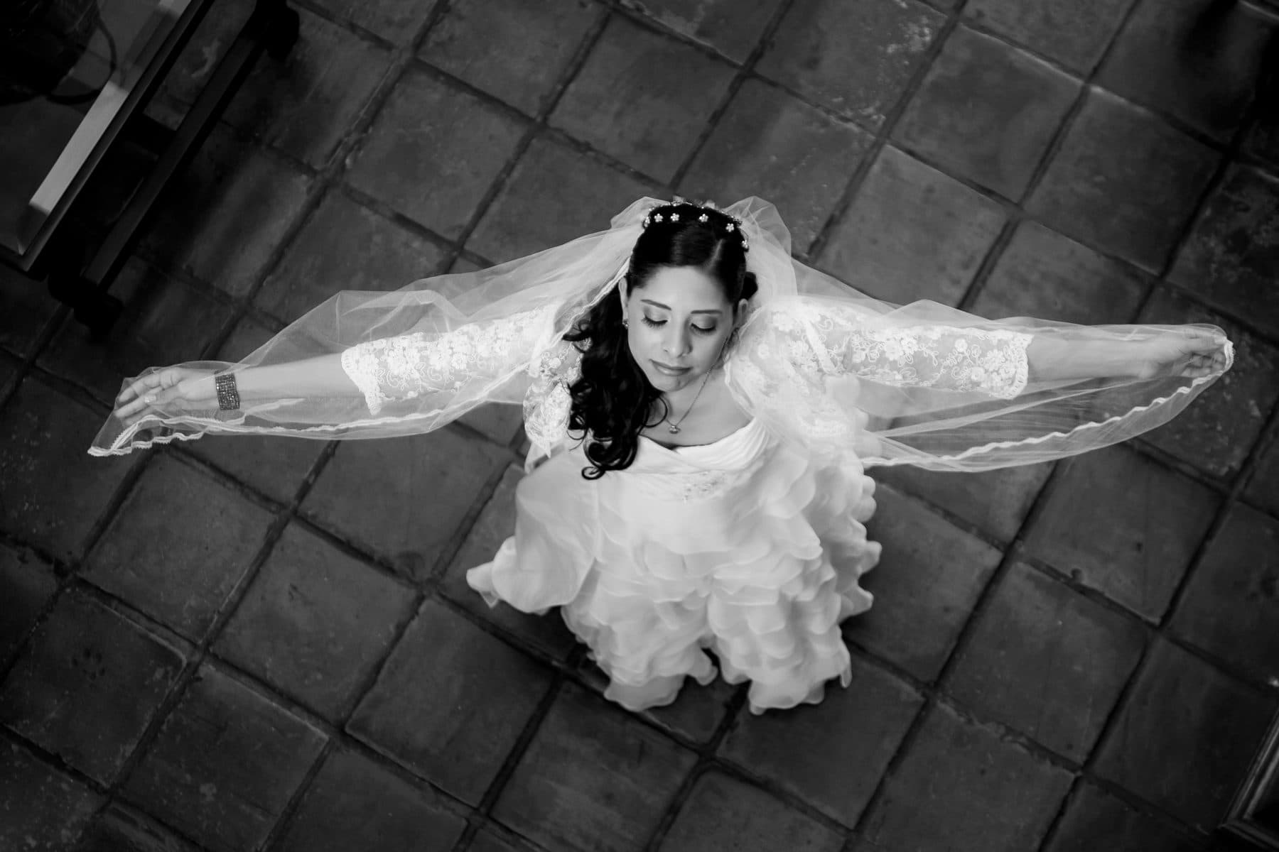 A solitary dance, arms outstretched, seen from above